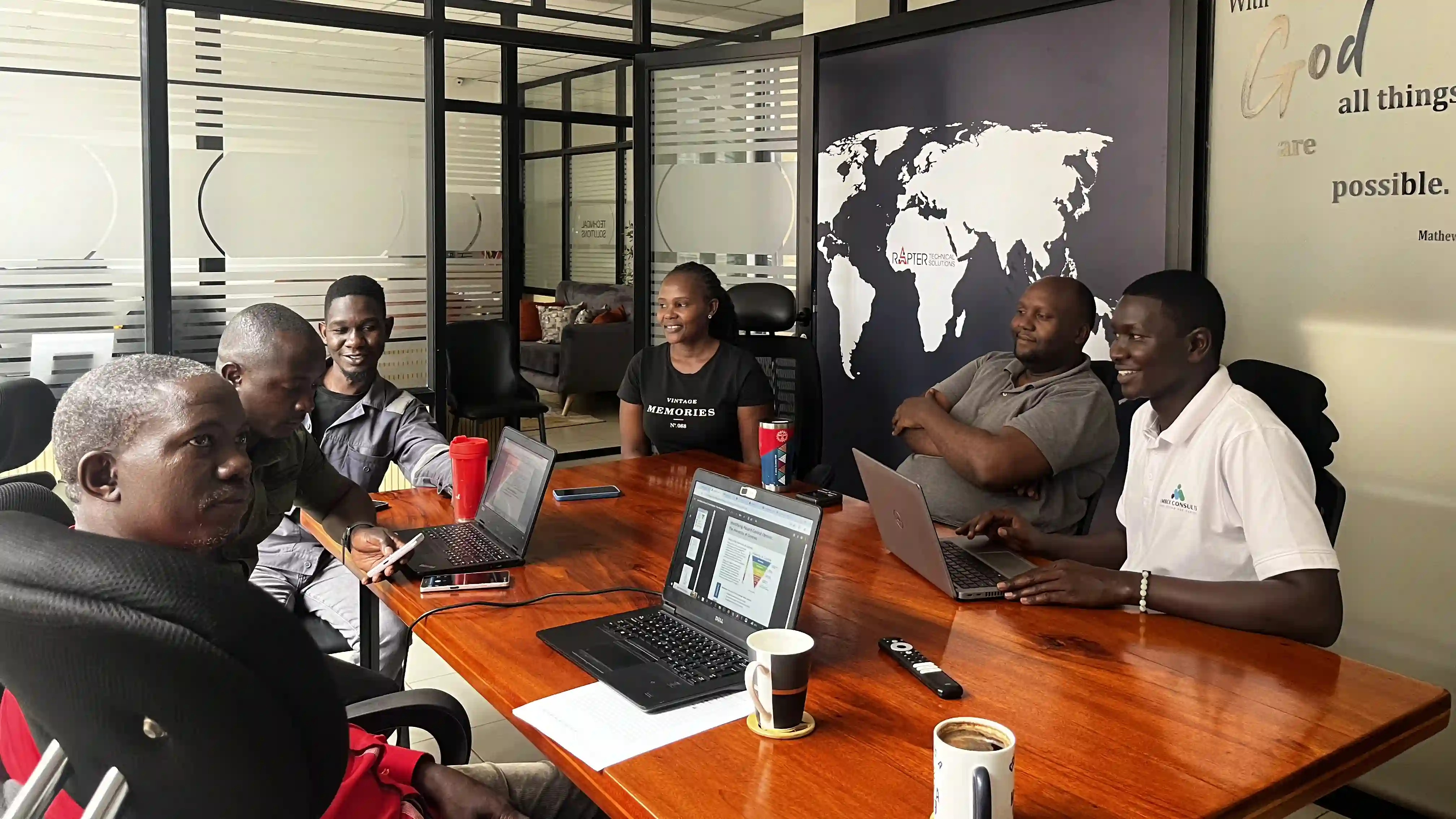 Consultants and site team reviewing plans together